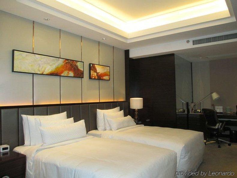 Riviera Hotel Ningbo Bagian luar foto