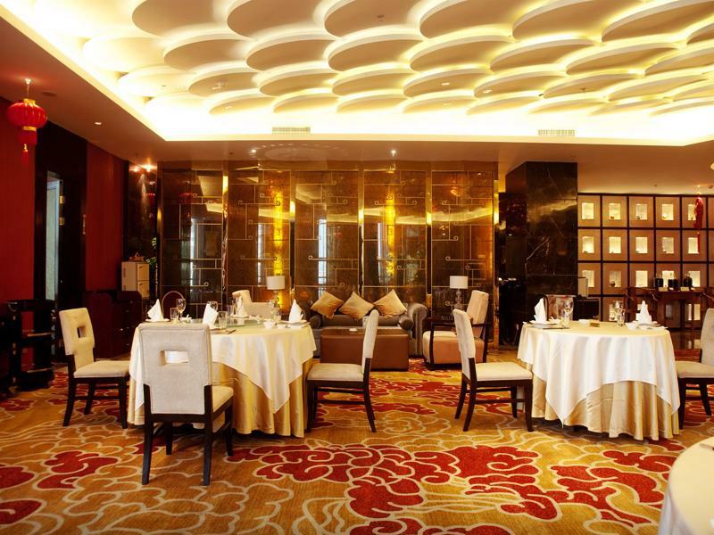 Riviera Hotel Ningbo Bagian luar foto